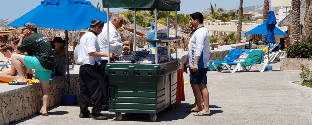 Preparing food in the new stations at Club Solaris Cabos